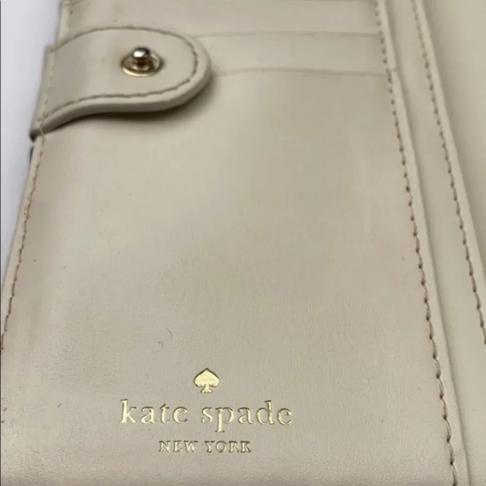 Kate Spade Cameron Slim Bifold wallet Bone Navy Stripe